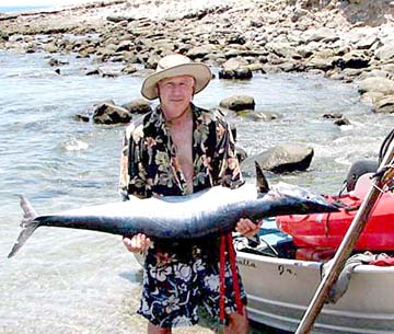 Spear fisherman and wahoo speared at Isla Cerralvo, Mexico.